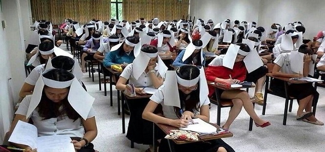 Cappello paraocchi per non copiare: il nuovo metodo introdotto da un’università thailandese